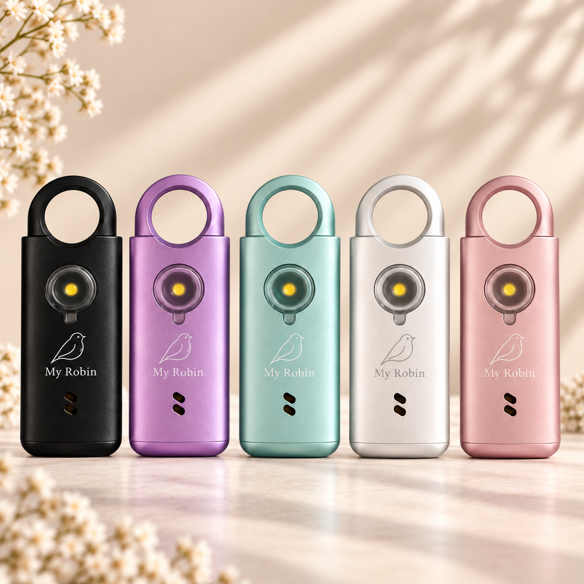 My Robin personal safety alarms in black, purple, turquoise, silver and pink