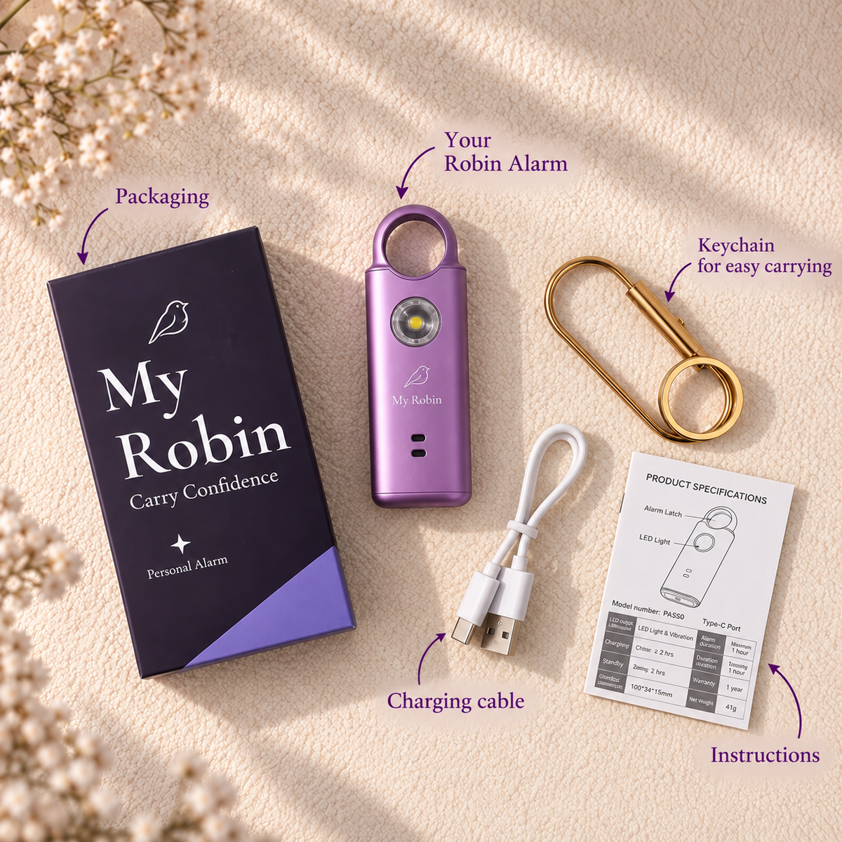 Purple My Robin personal safety alarm with packaging, separate keychain, USB charging cable and instructions